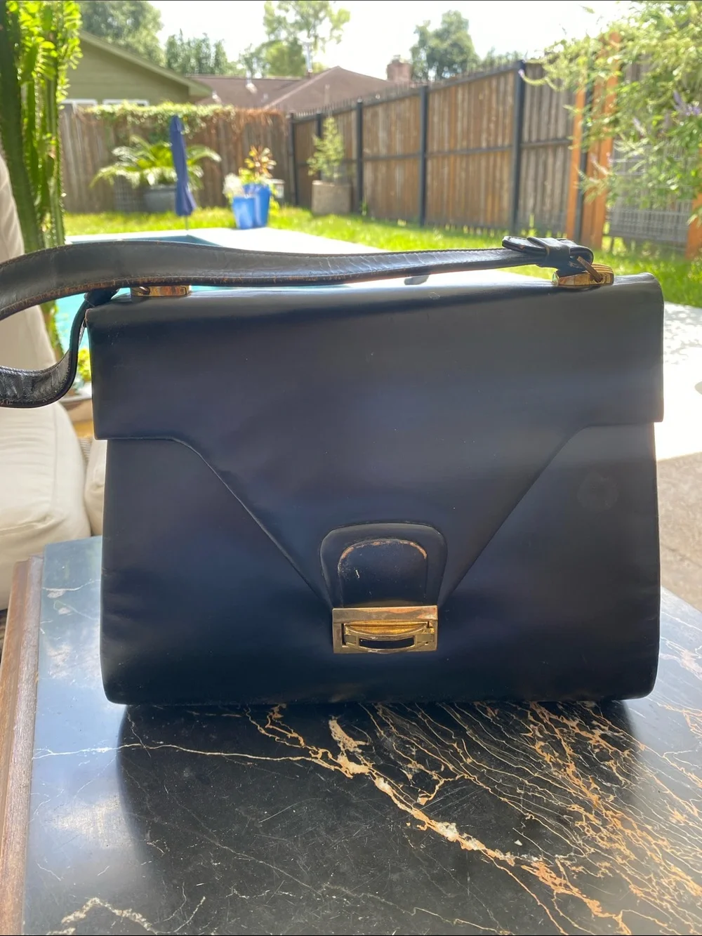 Classic Black Leather Shoulder Bag with Gold Tone Hardware
